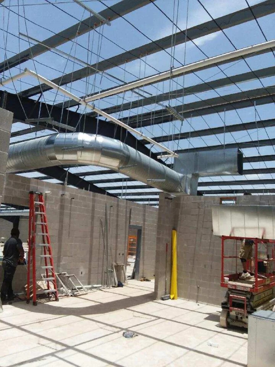 Row of outdoor air conditioning units installed at a commercial property